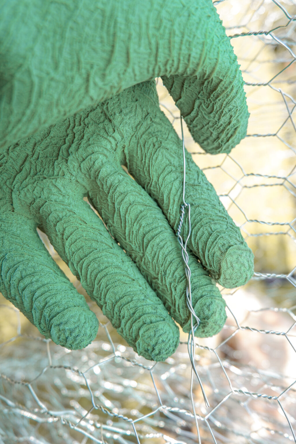 twisting-wire-on-chicken-wire