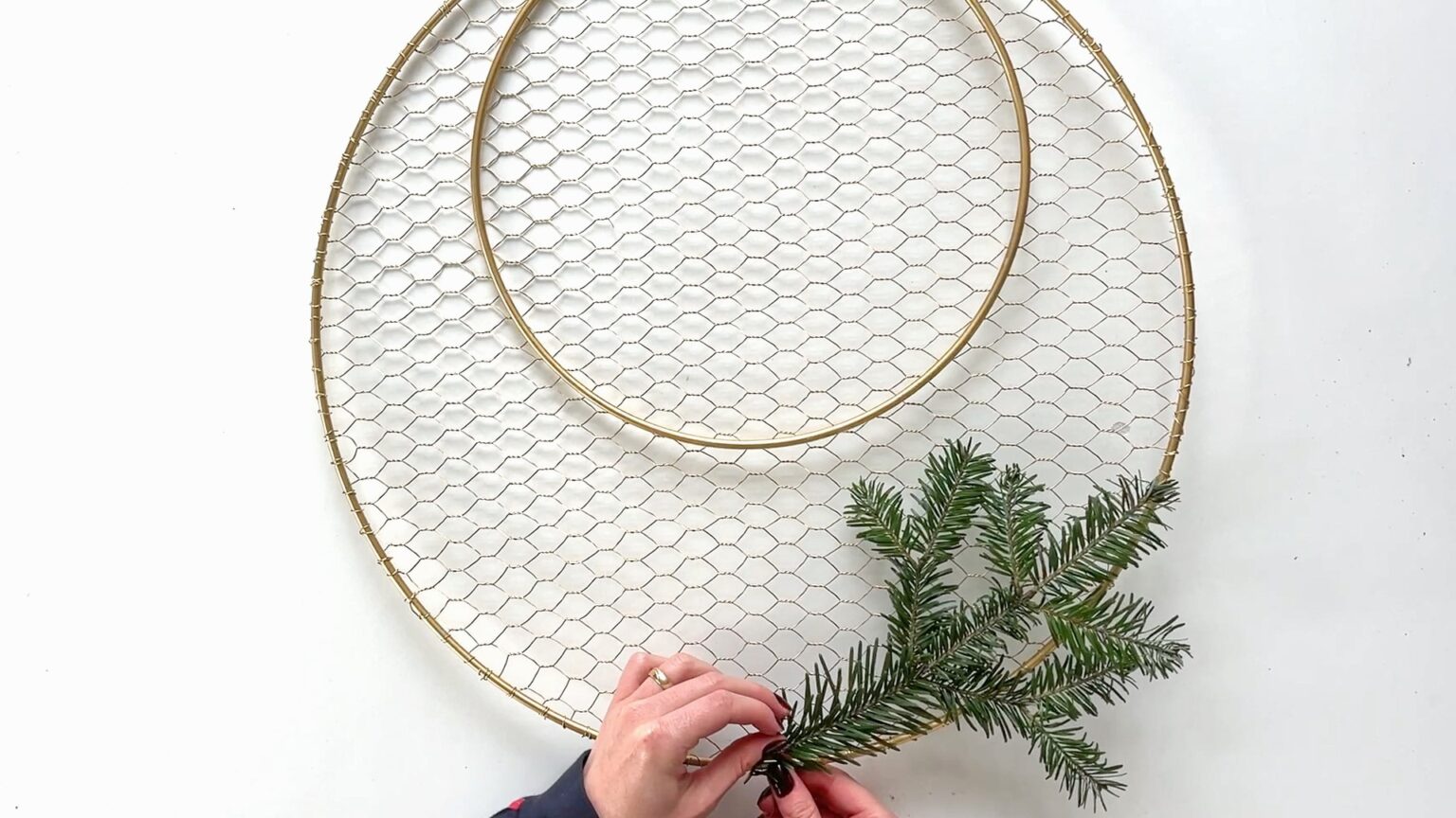 add-greenery-to-wreath